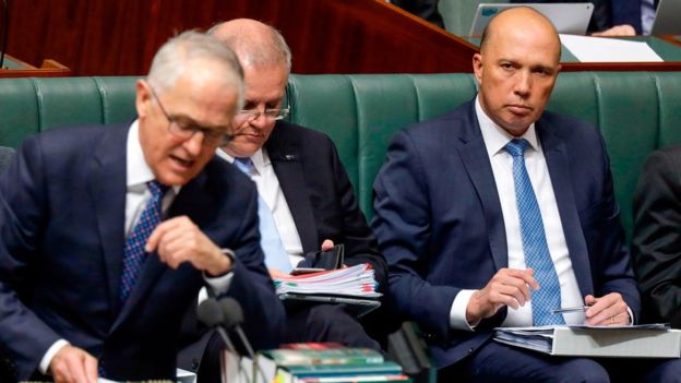 Peter Dutton (R) has stepped down as Home Affairs Minister