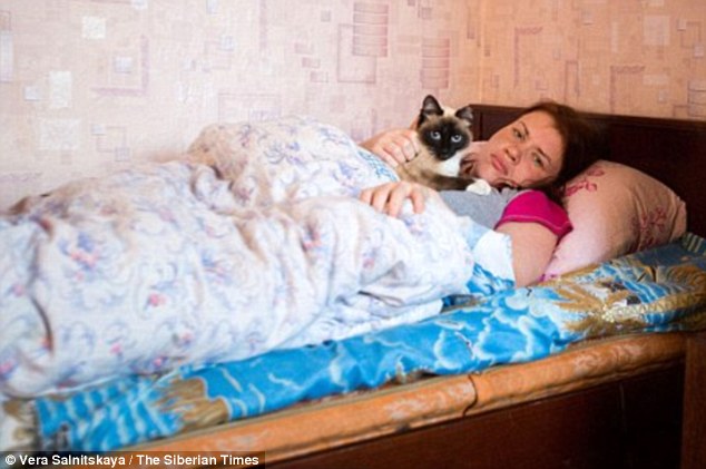 Victims: Photographer Vera Salnitskaya spent a night in the village earlier this year and was told of the bizarre symptoms that the residents suffered over the last few year