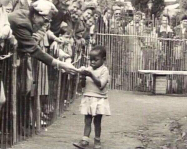 A young African girl on display inside a Human Zoo, Belgium, 1950s