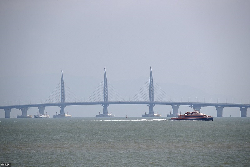 The project linking Hong Kong, Macau and China is 55 kilometres long and contains enough steel to build 60 Eiffel Towers | AP